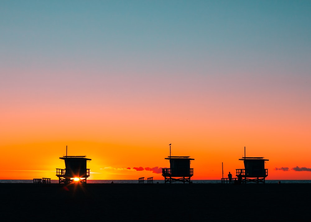 silhouette of building during sunset