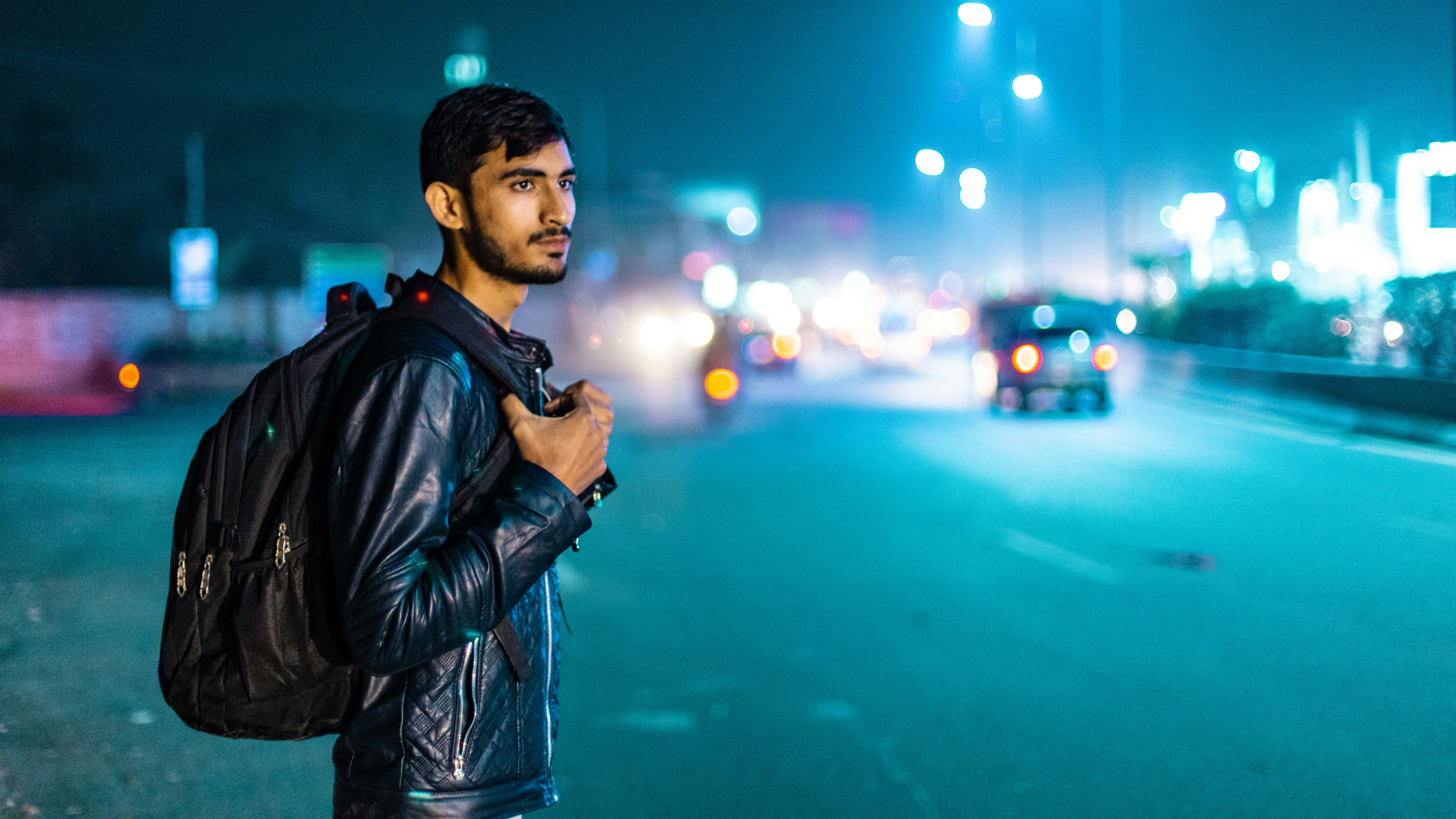 Haruki in urban street setting at night