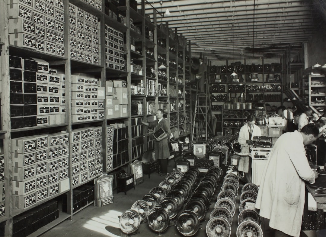 green and white wooden shelf, Hecla Electrics Pty Ltd, Workers Assembling Electrical Products, circa 1930