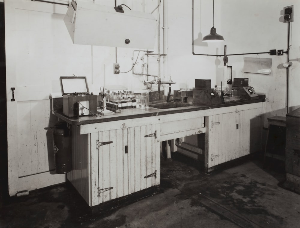 white wooden cabinet beside brown wooden desk