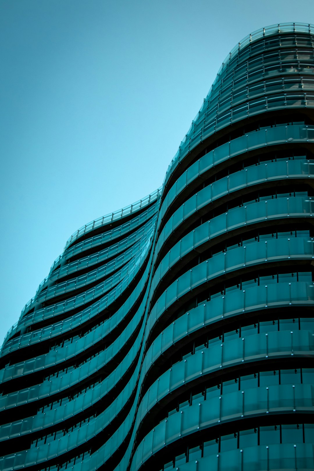 green and white high rise building