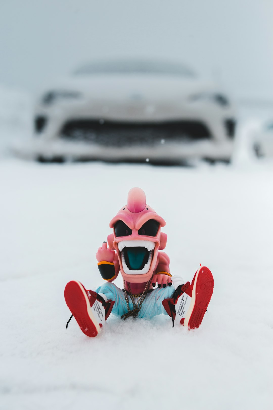 red and white snow goggles