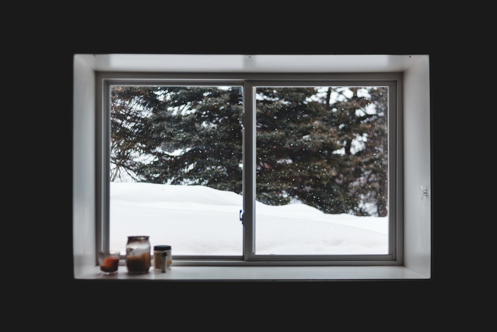 white wooden framed glass window