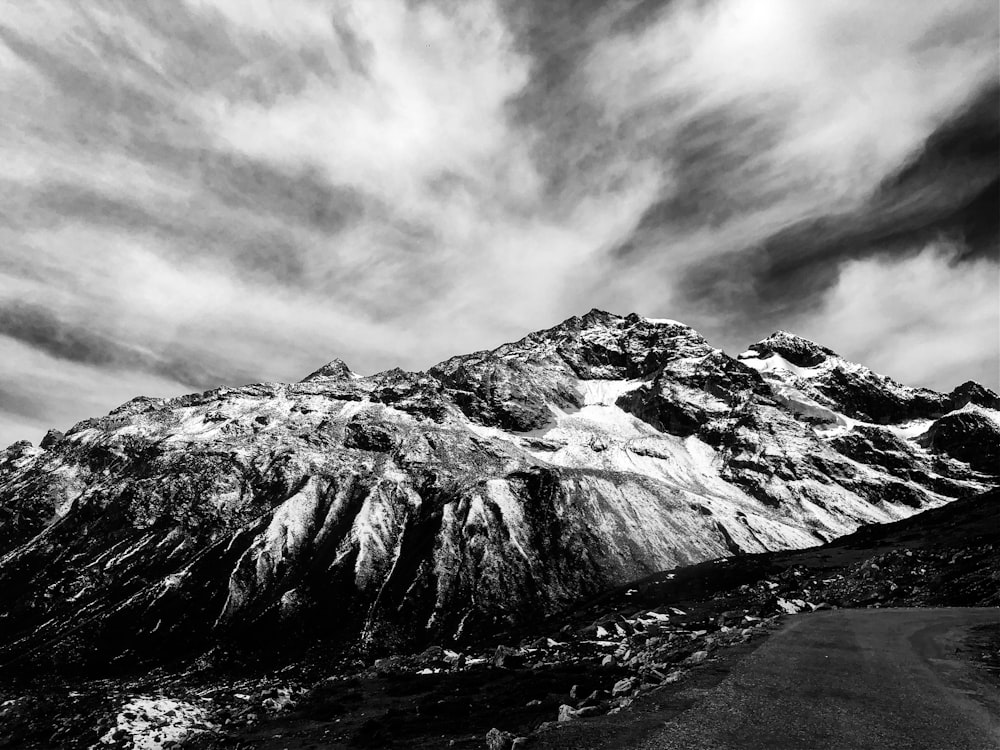 grayscale photo of rocky mountain