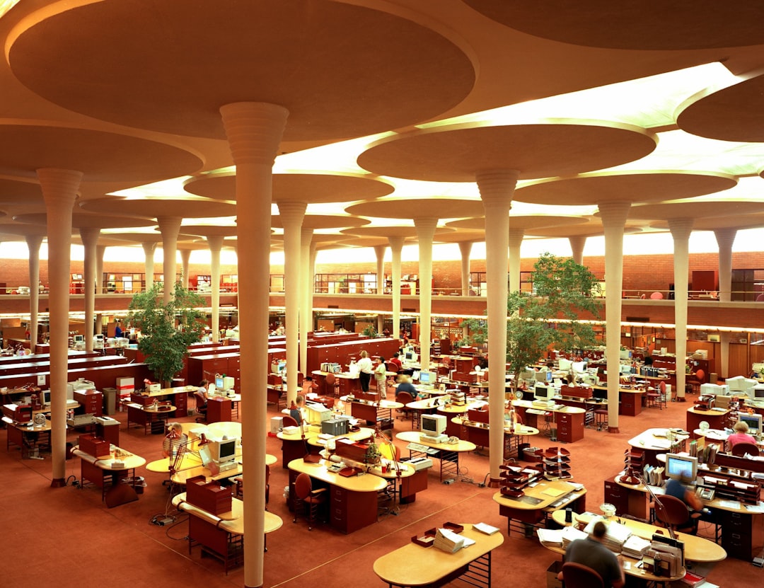 Work area at the Johnson Wax Building, headquarters of the S.C. Johnson and Son Co., Racine, Wisconsin. Color transparency by Carol M. Highsmith, [between 1980 and 2006]. Library of Congress Prints & Photographs Division.

https://www.loc.gov/resource/highsm.15571/
