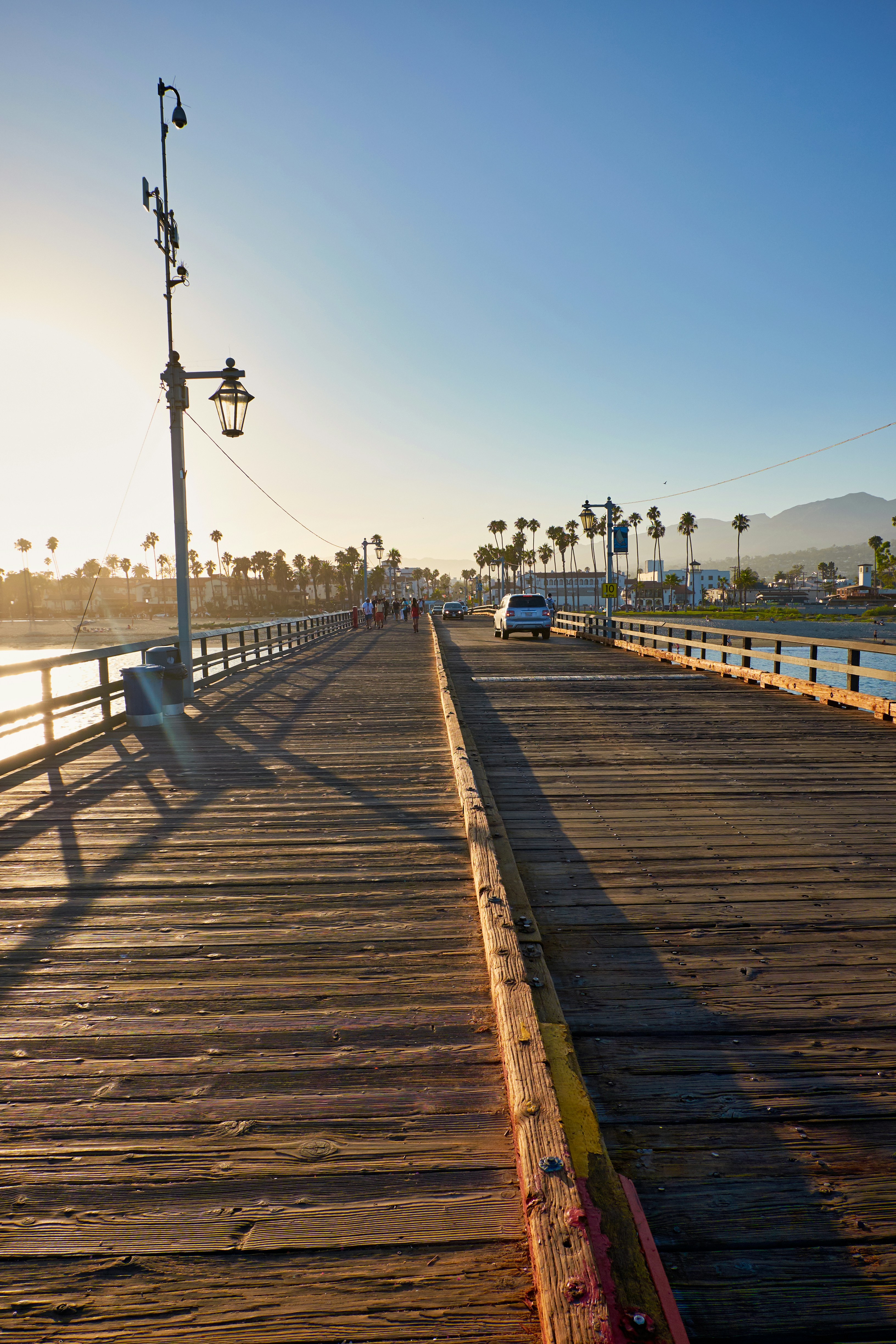 people walking on wooden dock during daytime