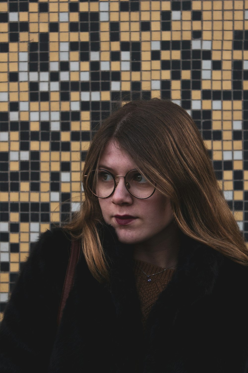 woman in black framed eyeglasses