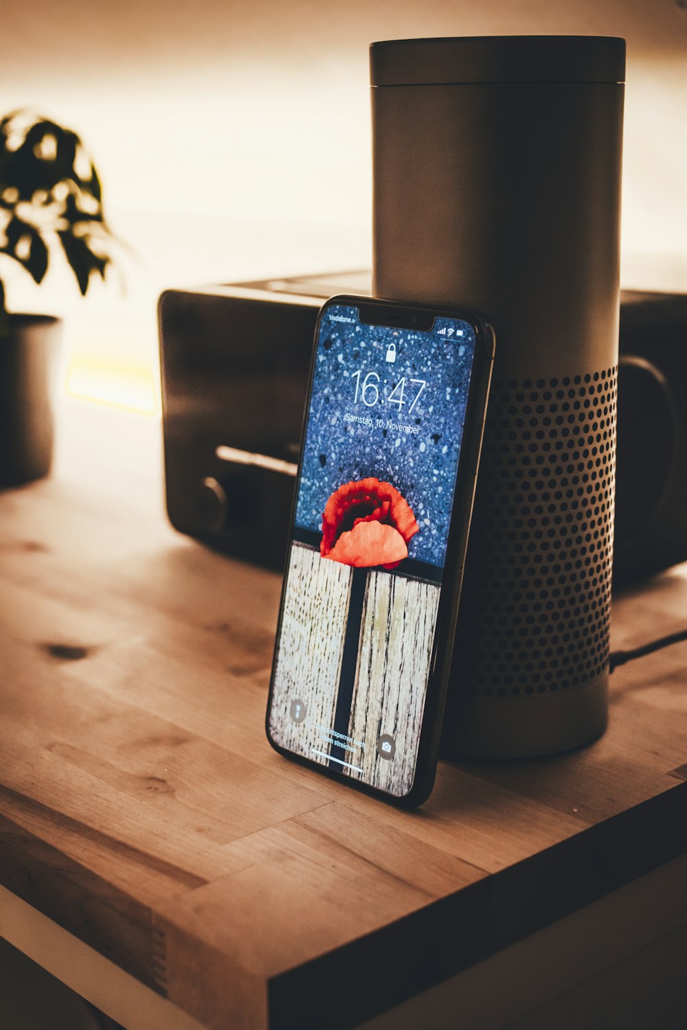 black iphone 7 on brown wooden table