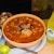 soup with meat in white ceramic bowl