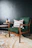 white throw pillow on green sofa chair