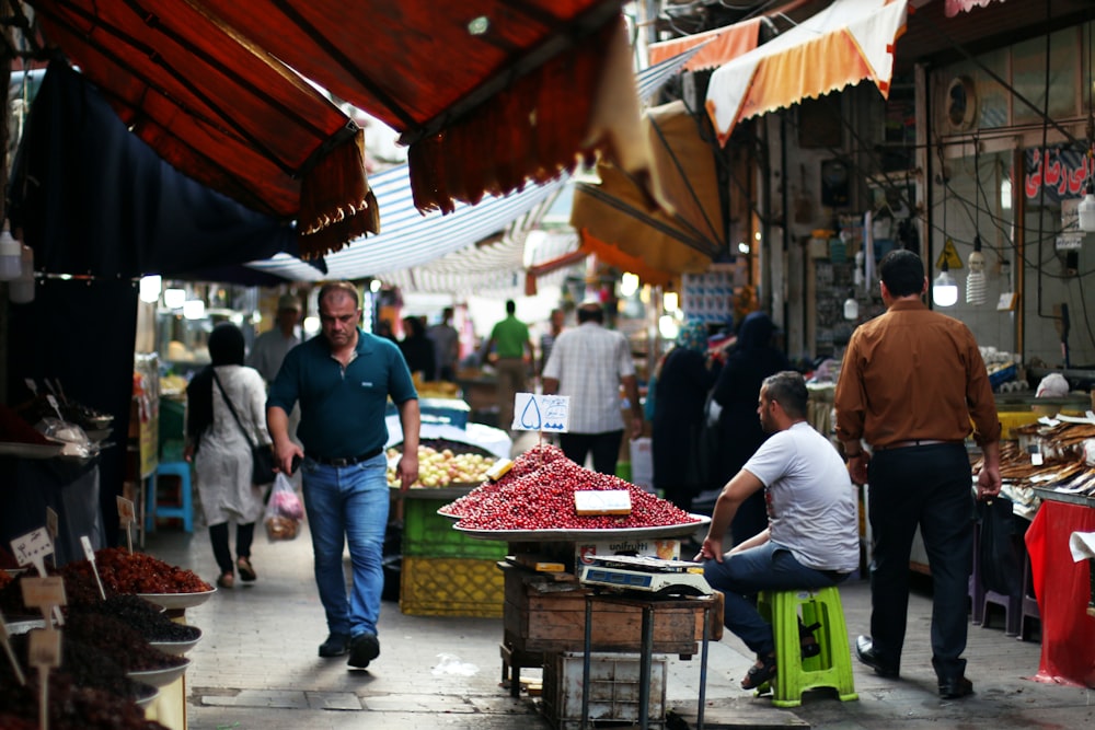 people walking on market during daytime