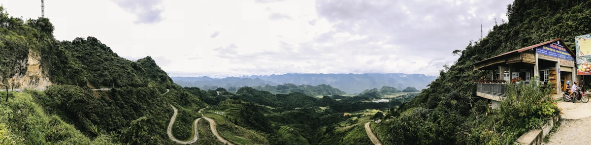 At Quản Bạ's Heaven's Gate, the valley falls away and the legendary Núi Đôi twin peaks rise from the mist like a secret the mountains have kept for centuries.