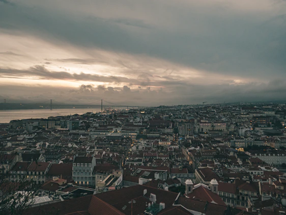 A panoramic view of a Hong Kong cityscape at dusk, overlaid with digital data streams and cloud network icons.