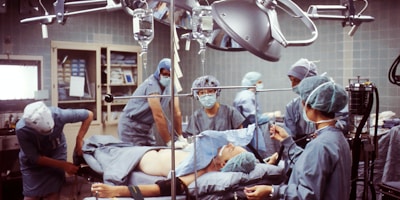 group of people wearing blue scrub suit