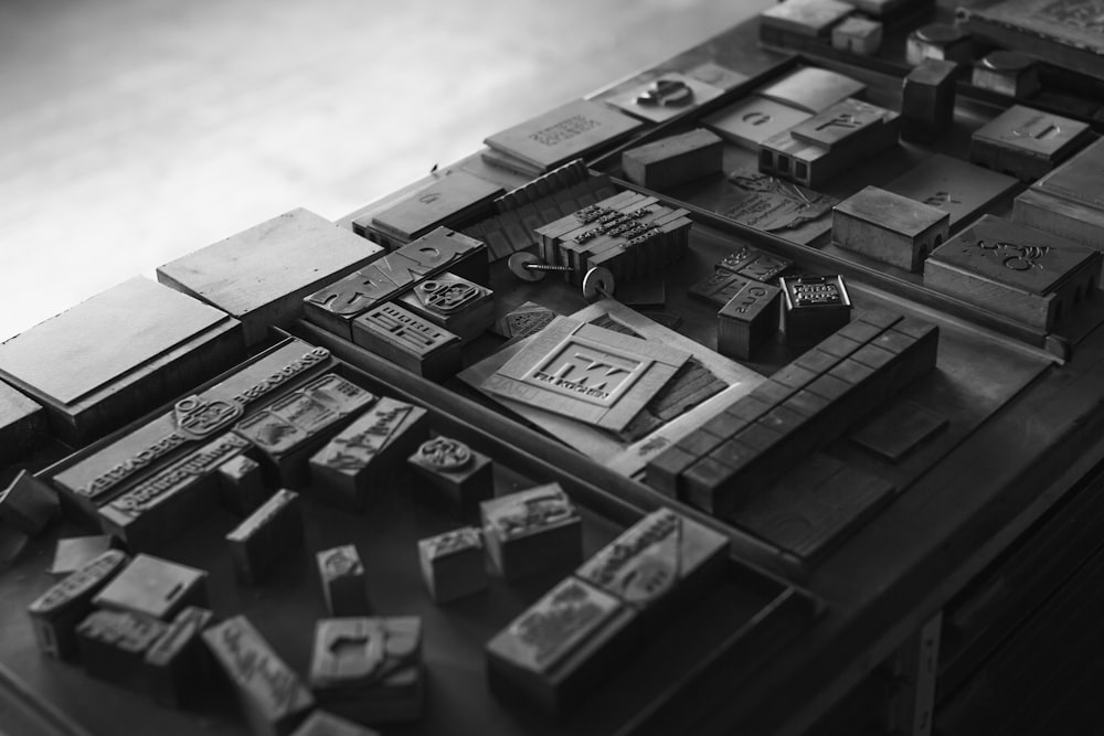 grayscale photo of wooden blocks
