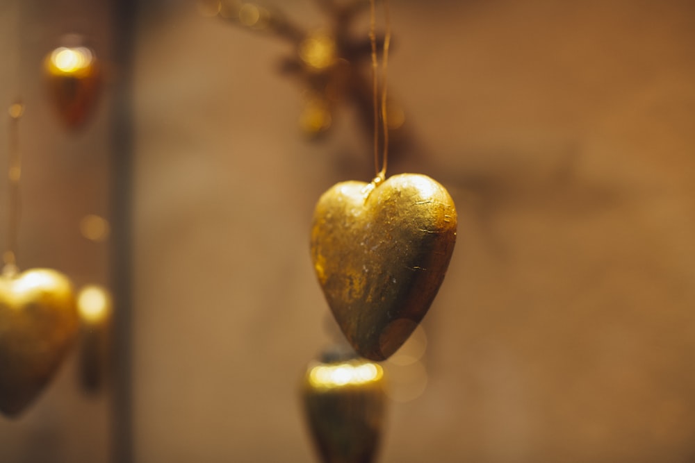 pendentif coeur vert et marron