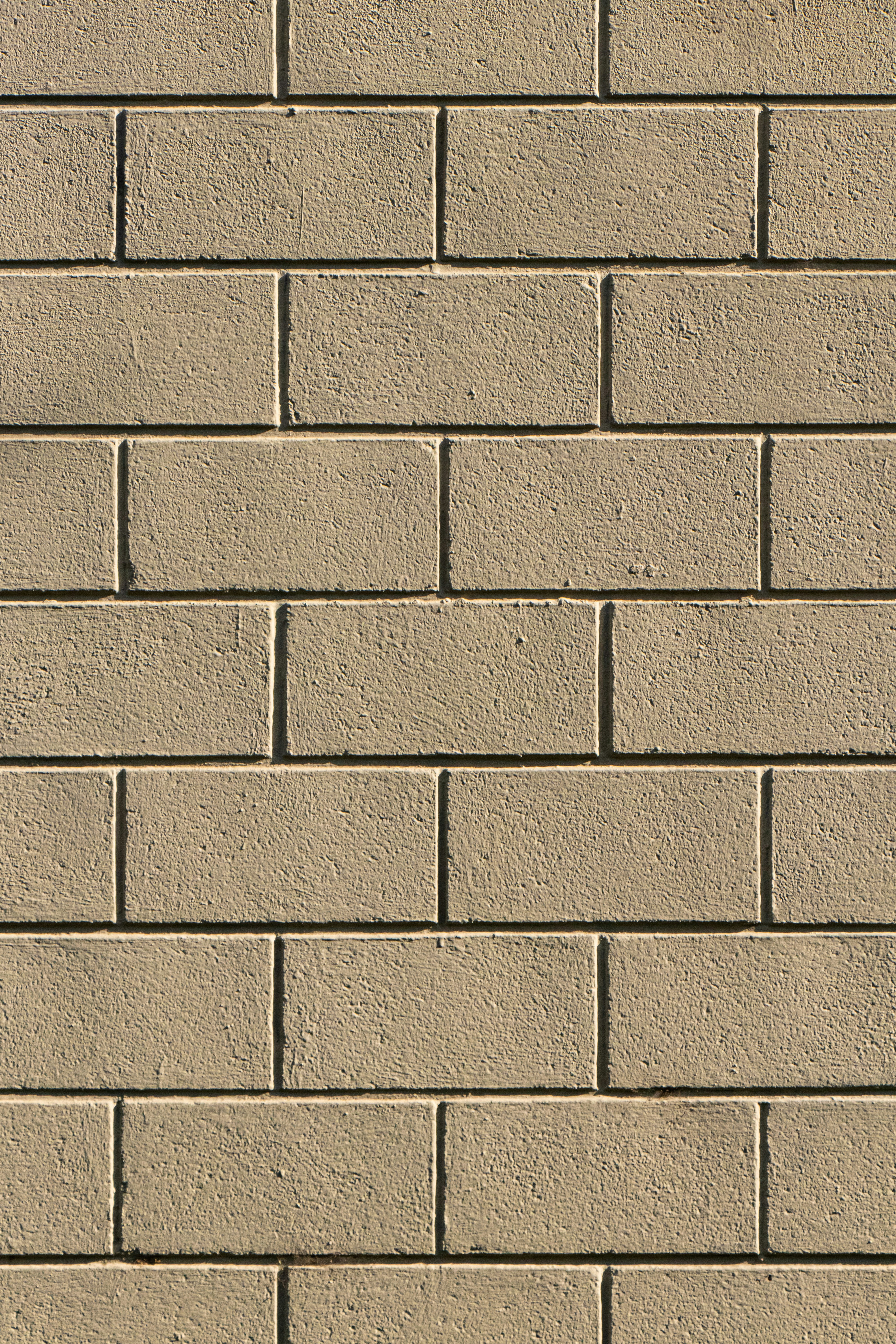 brown brick wall during daytime