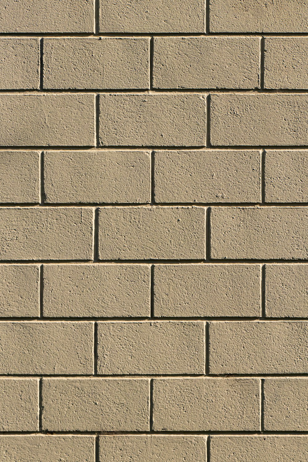 brown brick wall during daytime