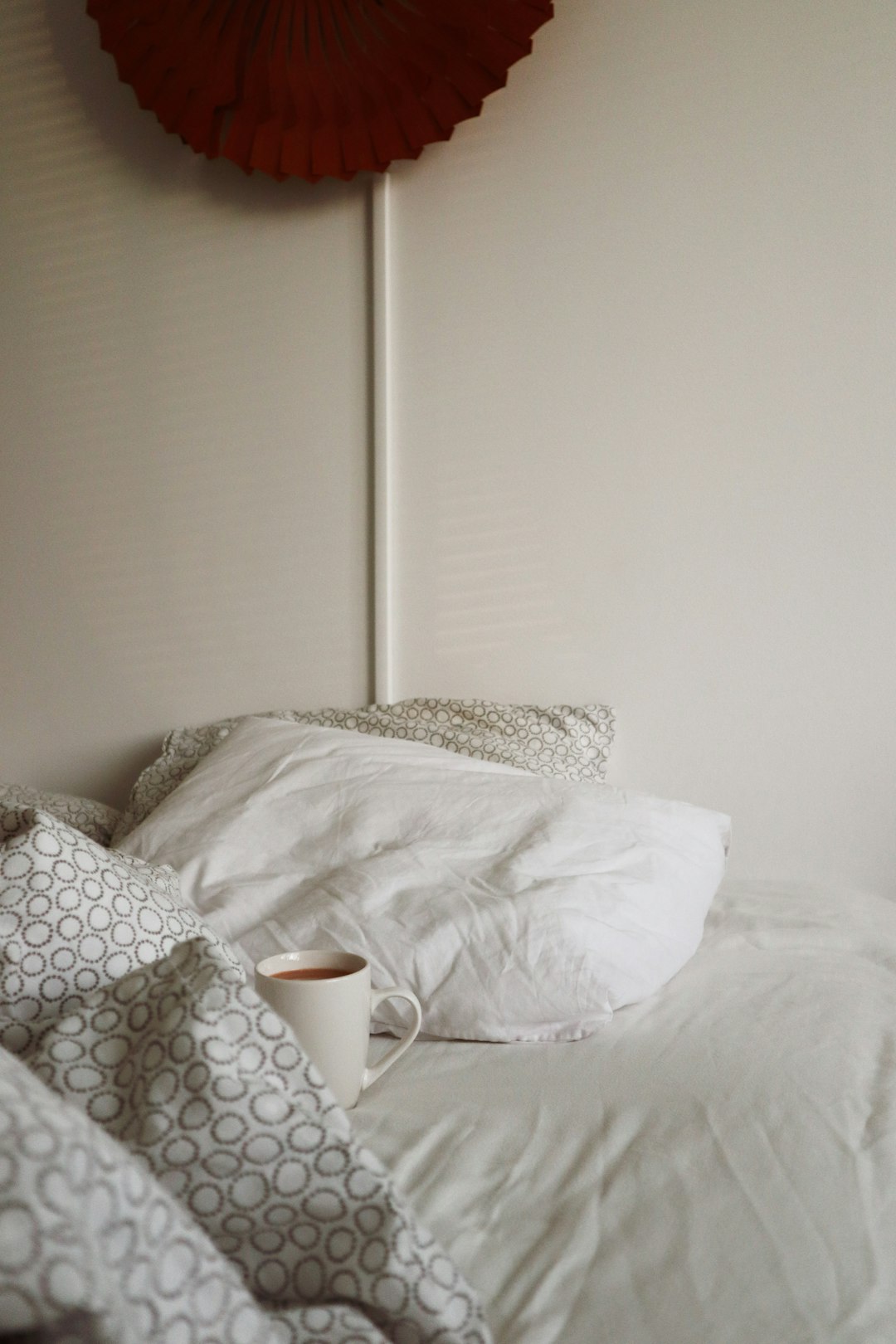 white and black polka dot textile