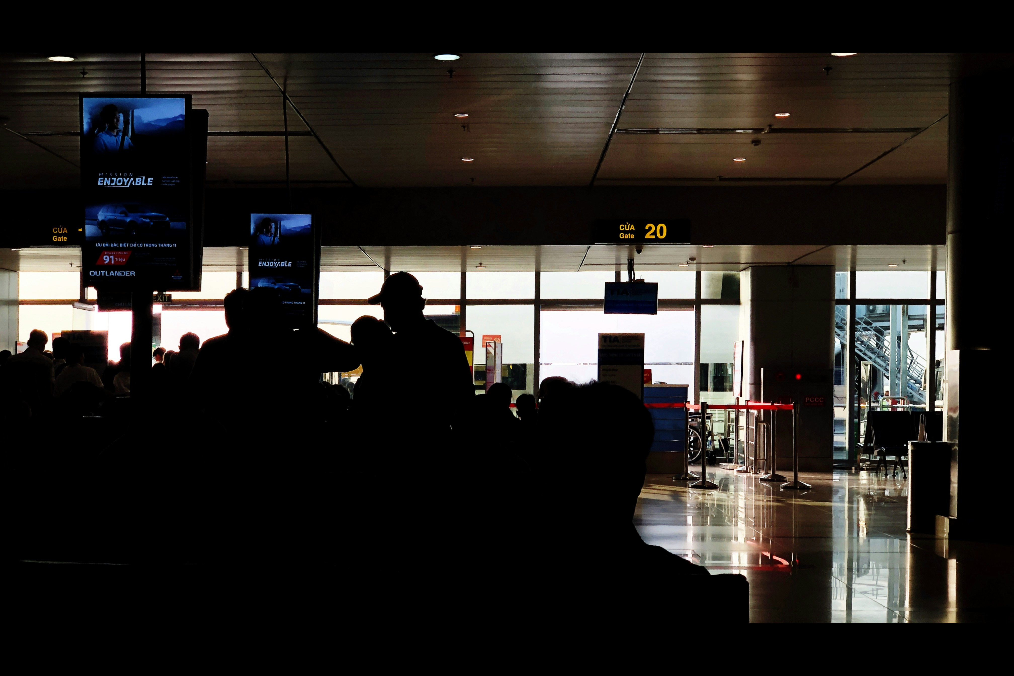 silhouette of people inside building