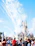 A happy family enjoying a magical moment in front of Cinderella's Castle at Disney.
