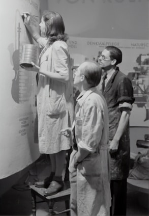 A professional painting team working on a project.