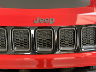 Jeep Wrangler JK cooling system parts arranged neatly on a black textured surface.