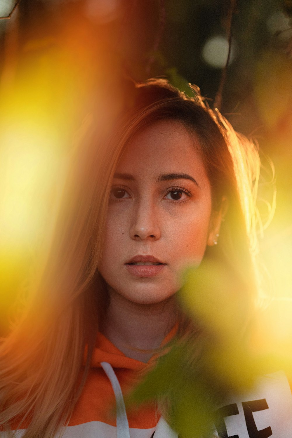 woman in green and orange crew neck shirt