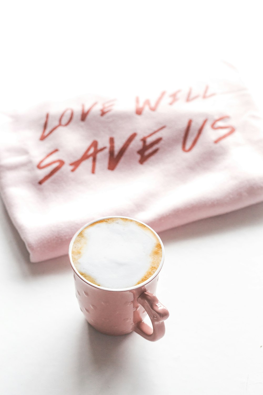 white ceramic mug with coffee