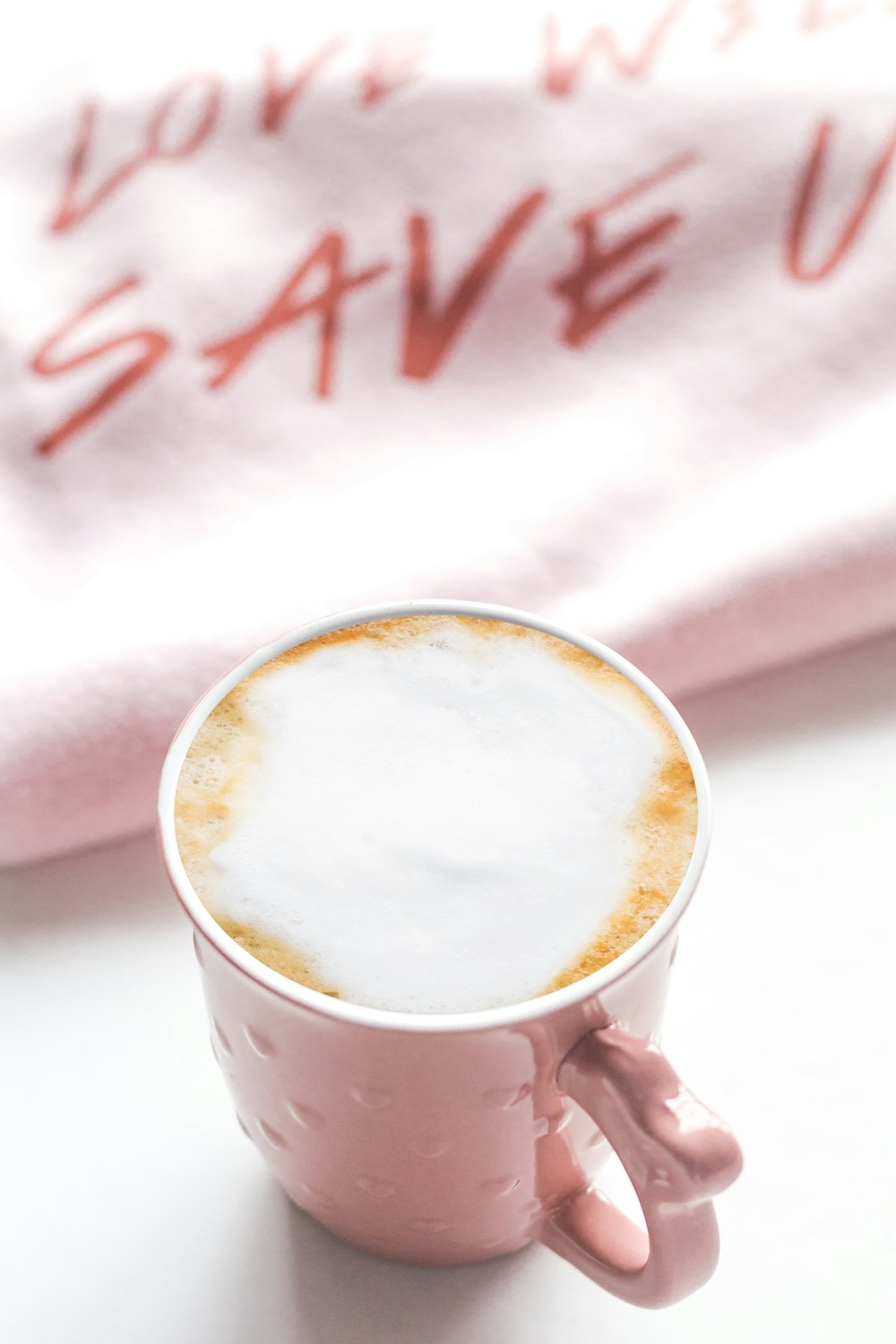 white ceramic mug with coffee