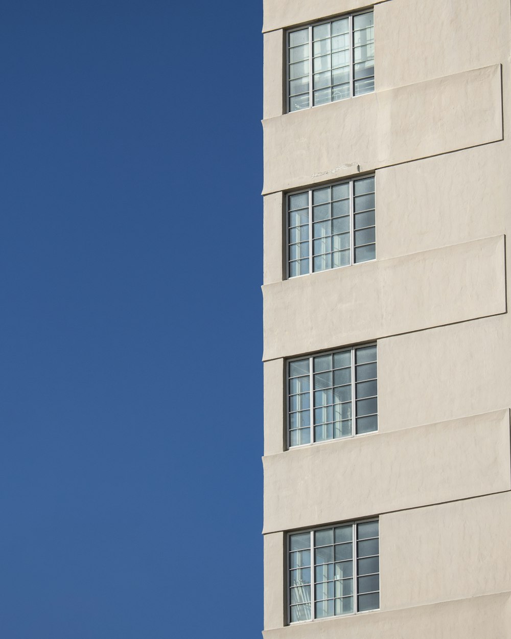 brown concrete building under blue sky during daytime