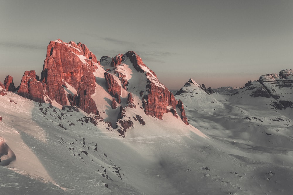 snow covered mountain during daytime