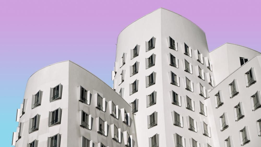 white concrete building under blue sky during daytime