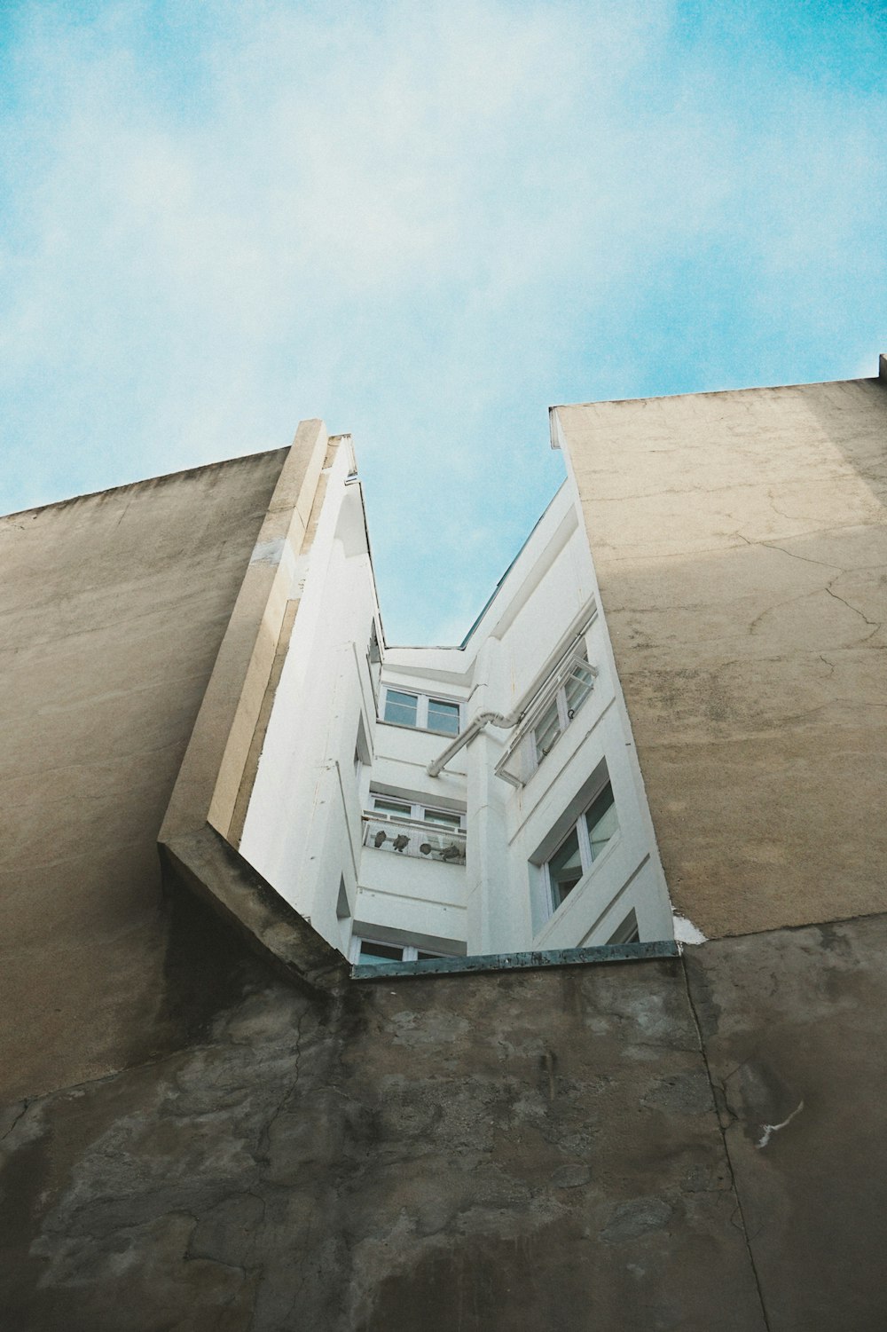 brown concrete building under blue sky during daytime