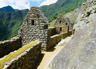 brown concrete ruins on hill during daytime