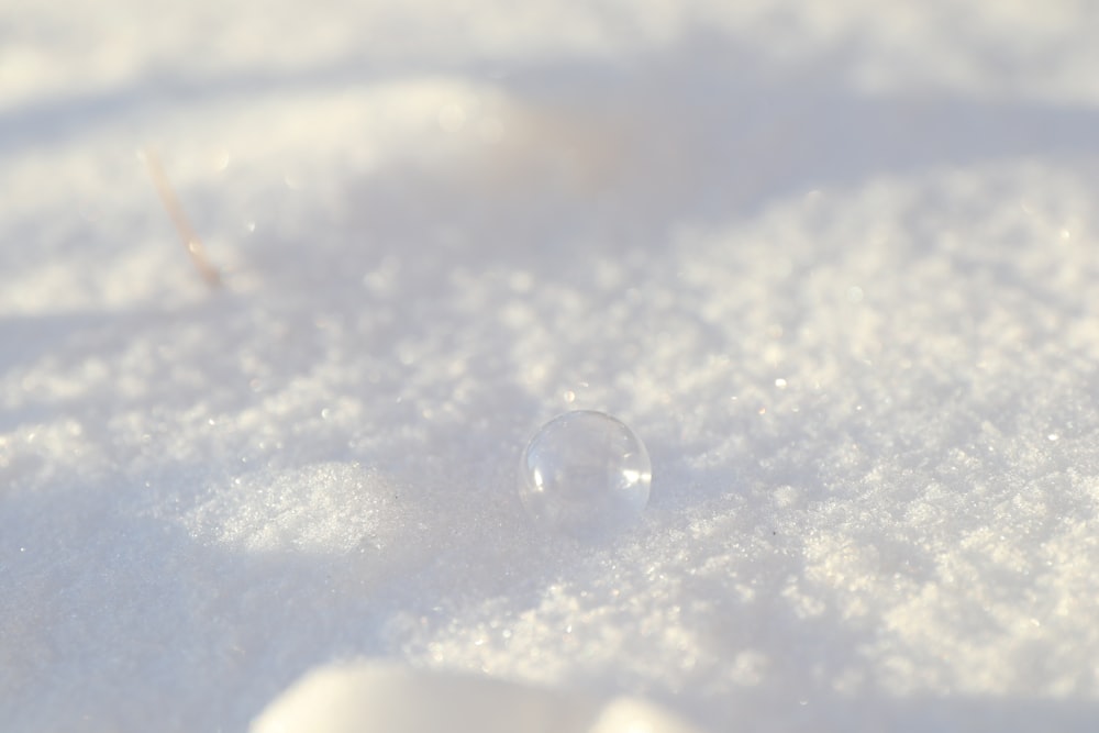 water dew on white textile