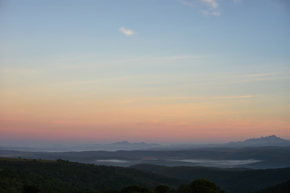 green mountains under blue sky during daytime