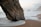 brown rock formation on beach during daytime