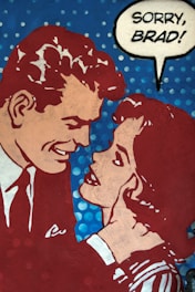A comic-style artwork depicting a man and a woman in a close, intimate pose. The man is smiling down at the woman, who is looking up at him with a serious expression. The woman is grabbing the man's collar while a speech bubble next to her contains the words 'SORRY, BRAD!'. The background is blue with white polka dots.