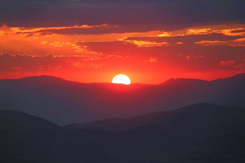 silhouette of mountains during sunset