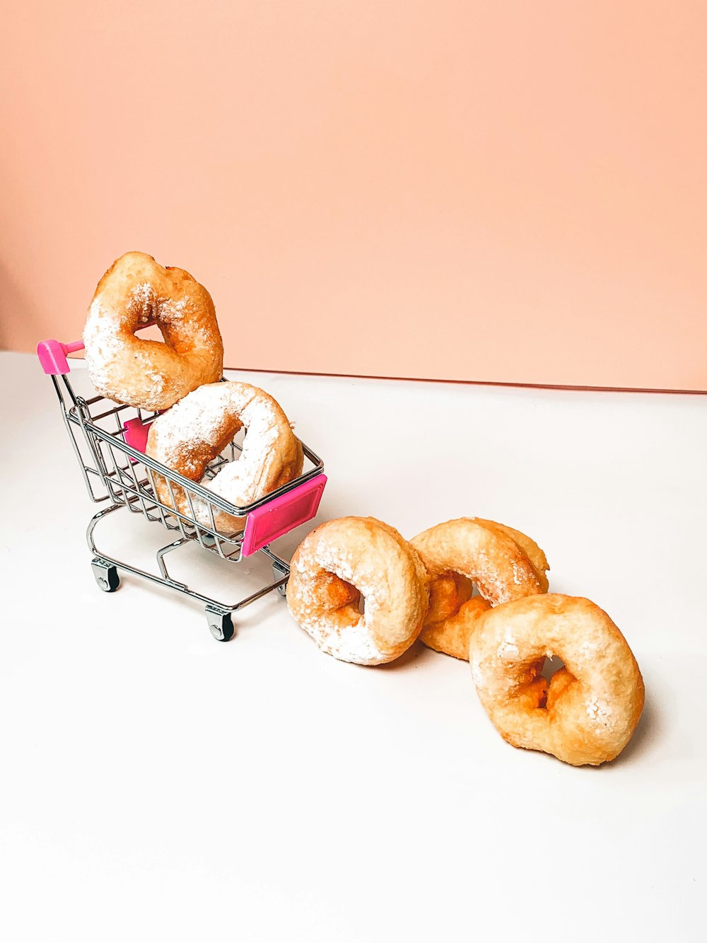 brown donuts on stainless steel rack