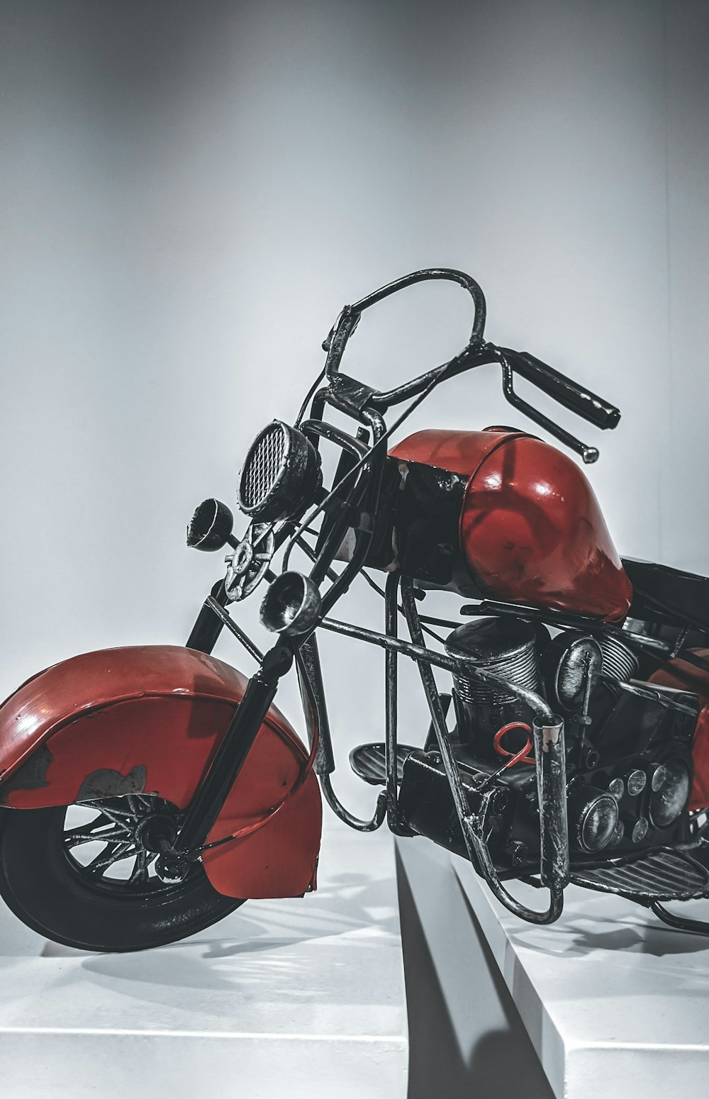 red and black motorcycle scale model