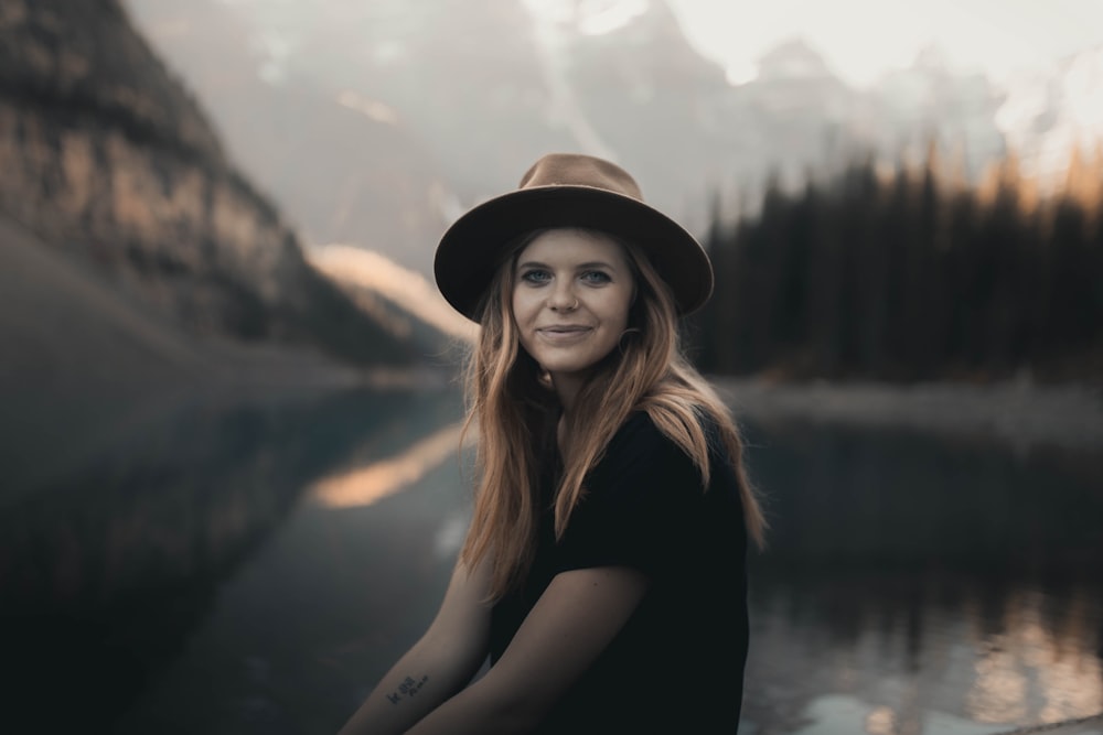 woman in black hat and black shirt