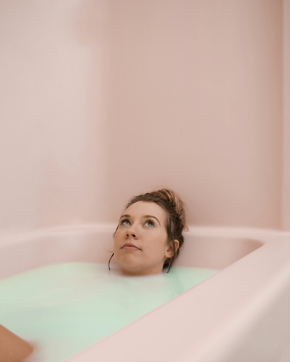 girl in bathtub with water