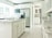 A beautifully designed kitchen featuring quartz countertops and elegant cabinetry.