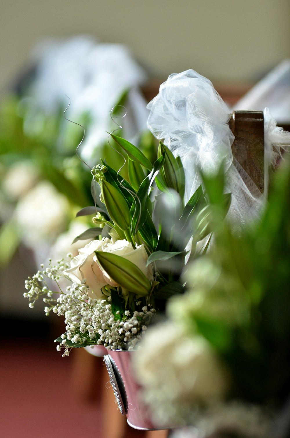 white flowers with green leaves