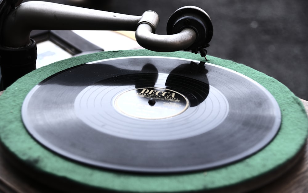 black and silver vinyl record player