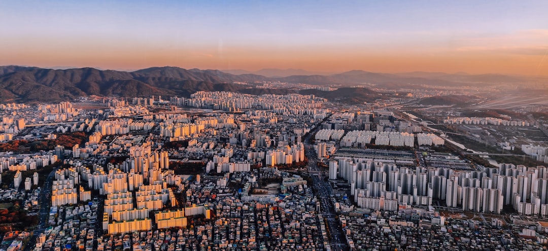 aerial view of city buildings during daytime, Seoul skyline sunset
