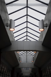 white pendant lamp turned on in building