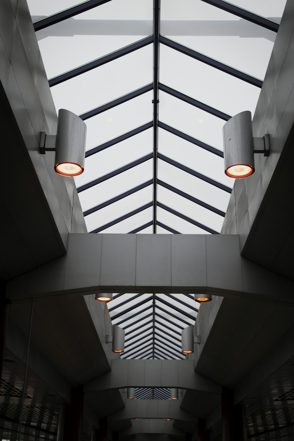 white pendant lamp turned on in building